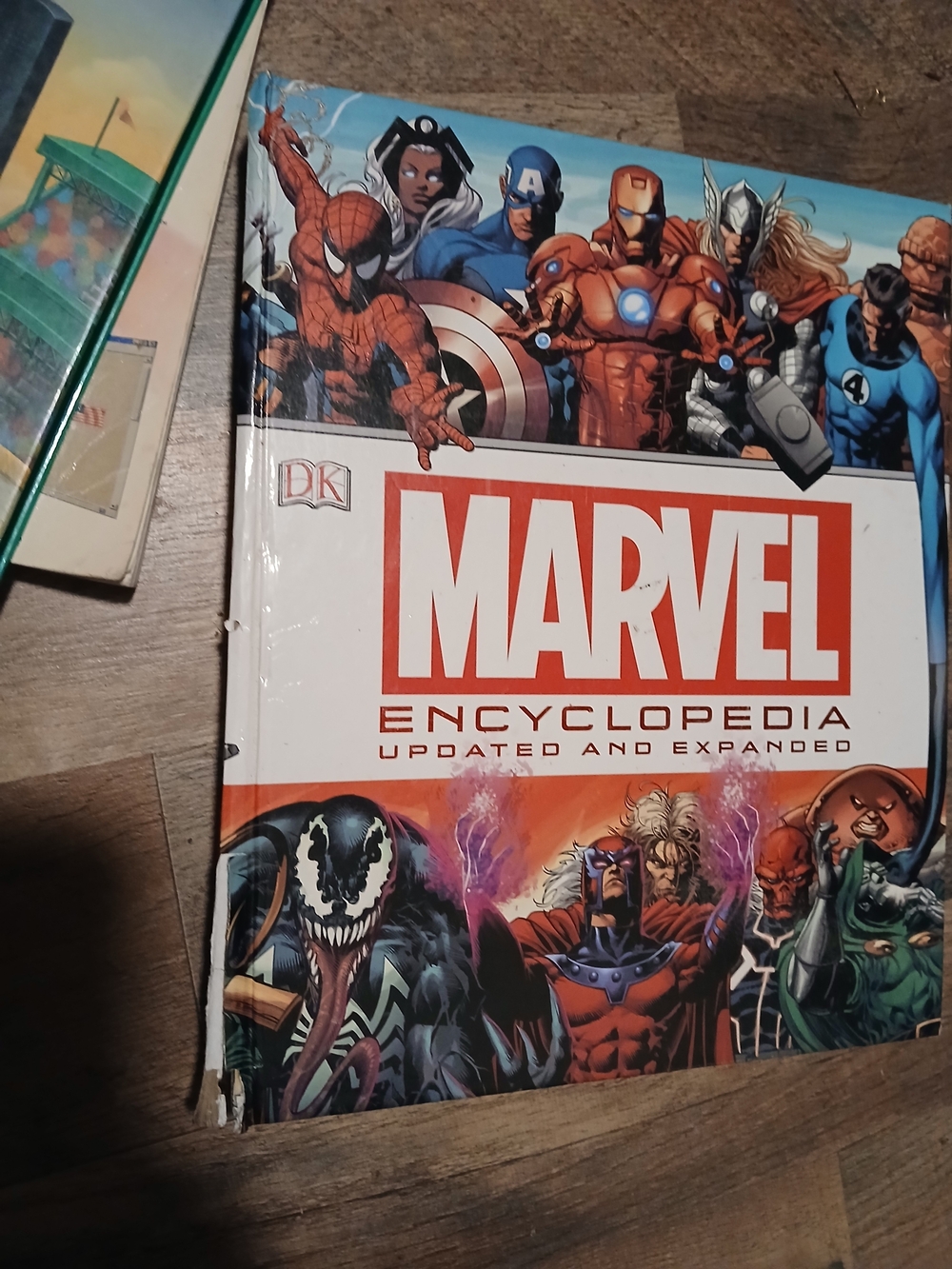 Marvel Encyclopedia Hardcover with Red & White Logo and Colorful Character Art